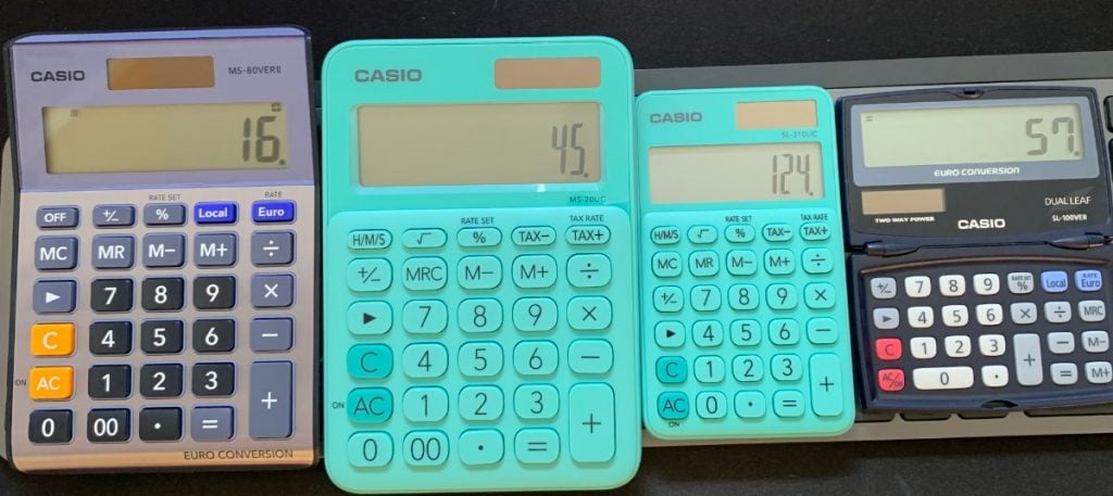 Two Casio desktop and 2 pocket calculators